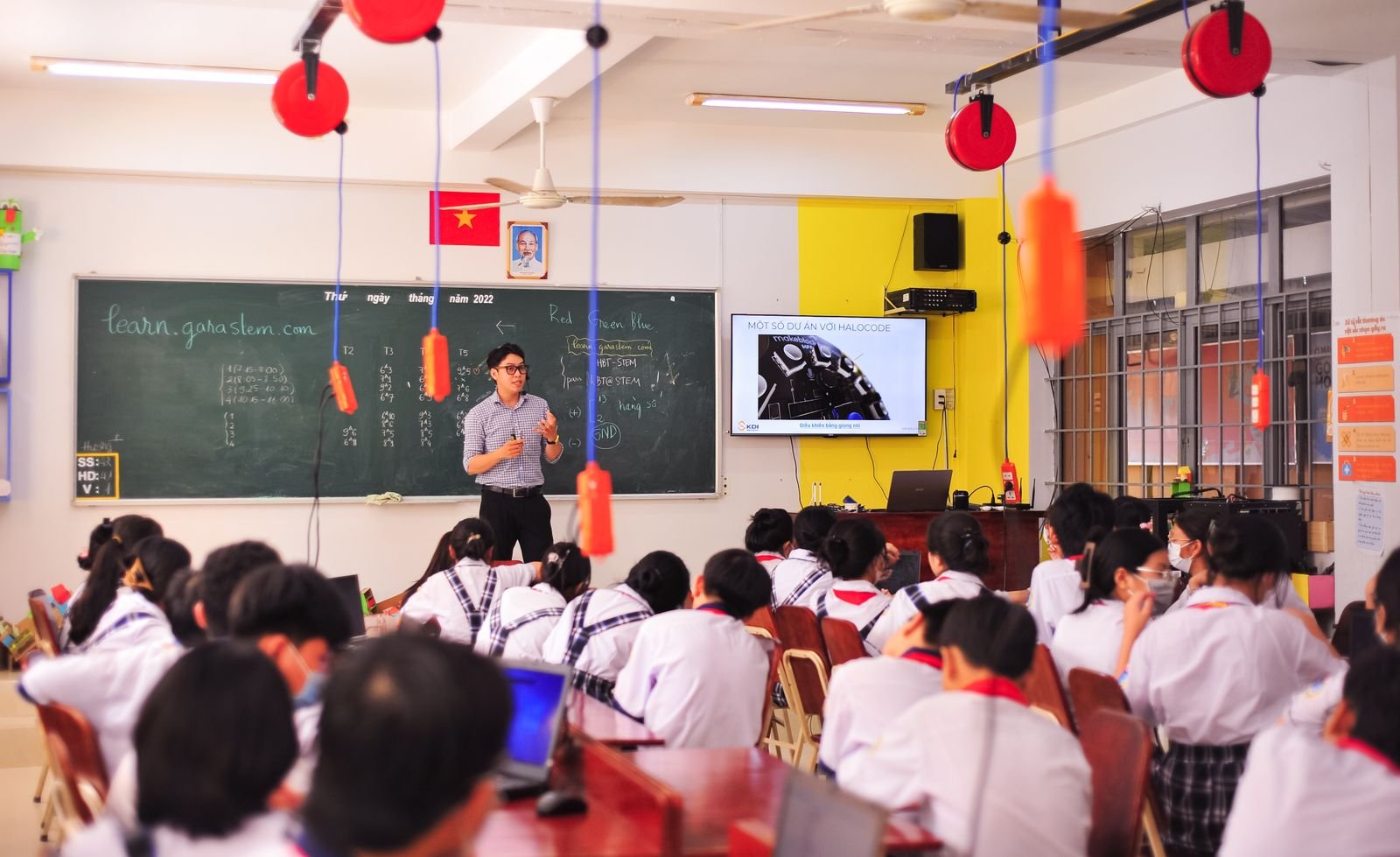 Teacher conducting interactive lesson with engaged students