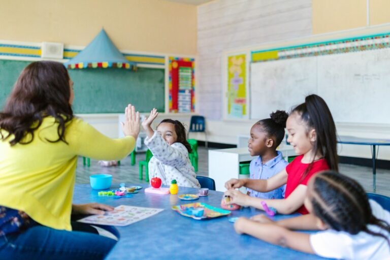 Students engaged in fun classroom activity with teacher